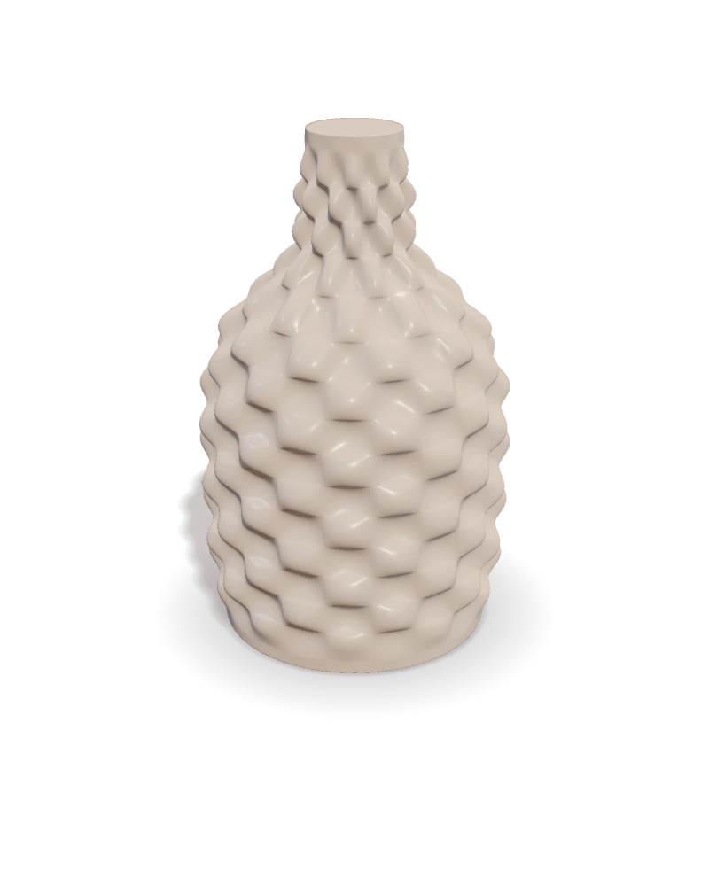 A quilted bottle shaped with the Maker quilt pattern